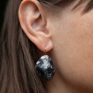 Hand-sculpted earrings.